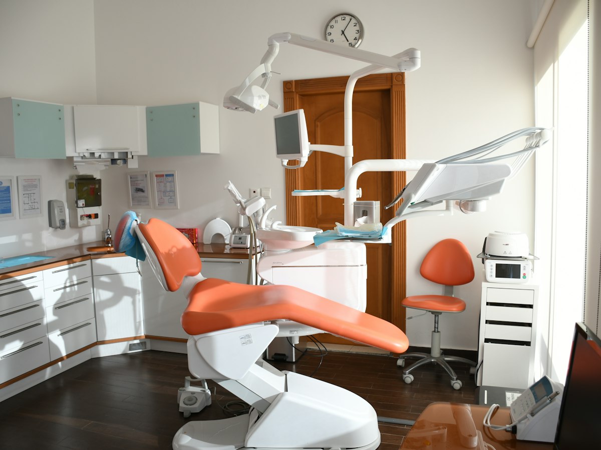 Dental treatment chair in a bright clinic