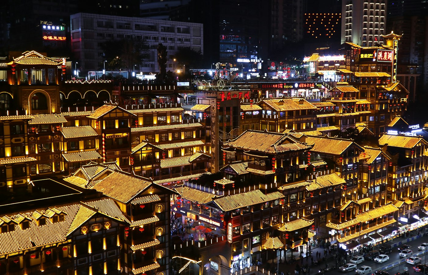 Hongyadong's stilt houses lit up in gold at night