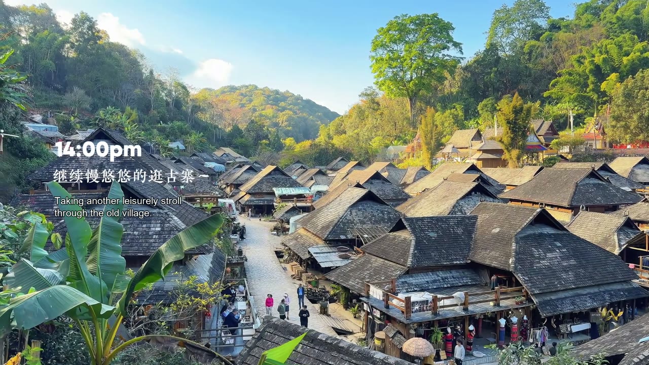 Village rooftops and tea-forest hills on Jingmai Mountain