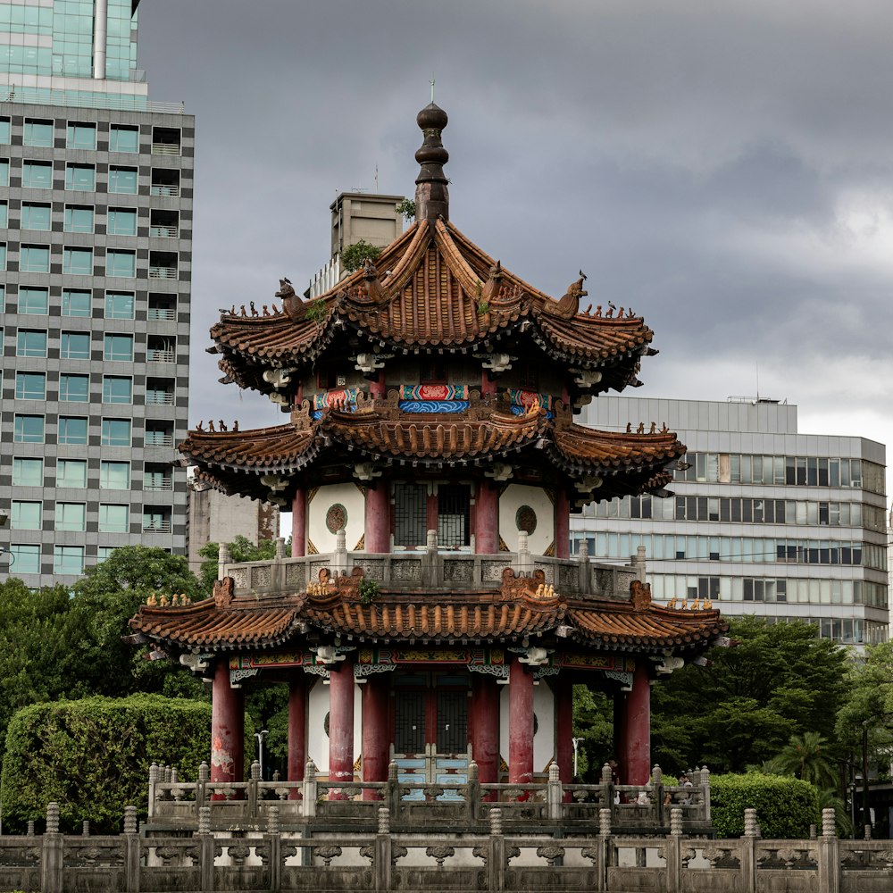An ornate traditional pavilion in a city park in Kunming